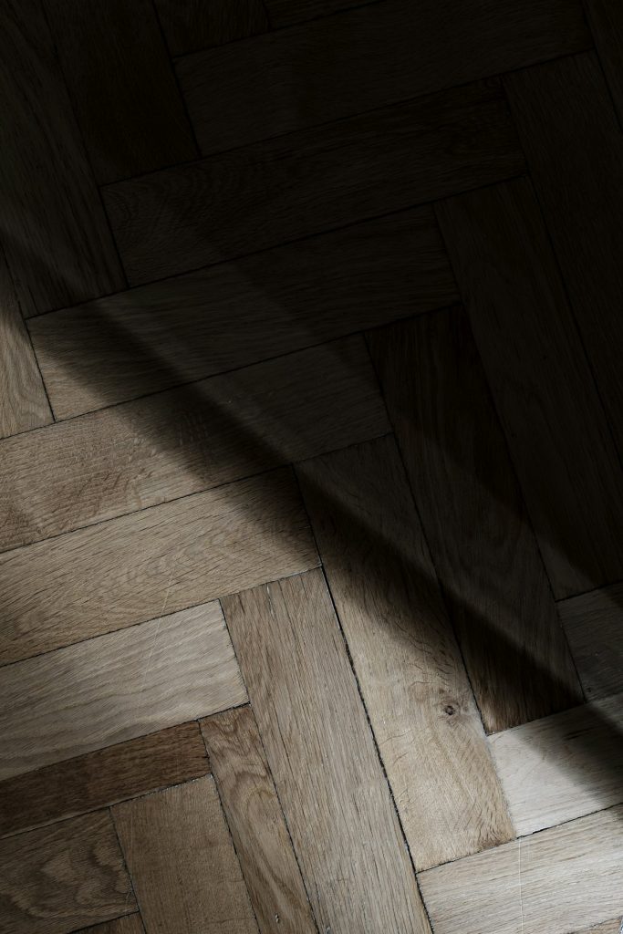 Sunlight falling across a polished wooden floor