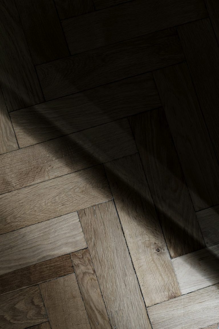 Sunlight falling across a polished wooden floor